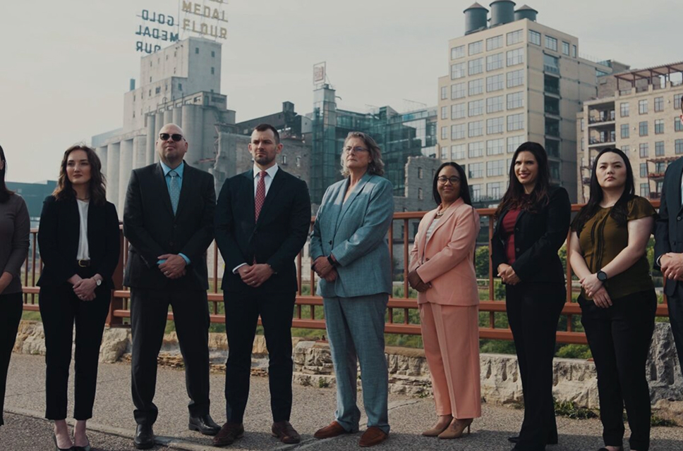 Wanta Thome attorneys standing together in Minneapolis